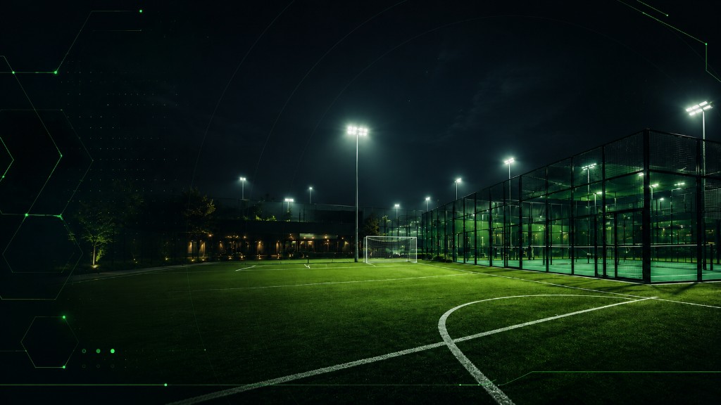 Complejo deportivo nocturno con canchas de fútbol y pádel iluminadas